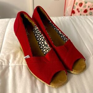 Tom’s wedges women’s 6.5 red in color 
Worn once